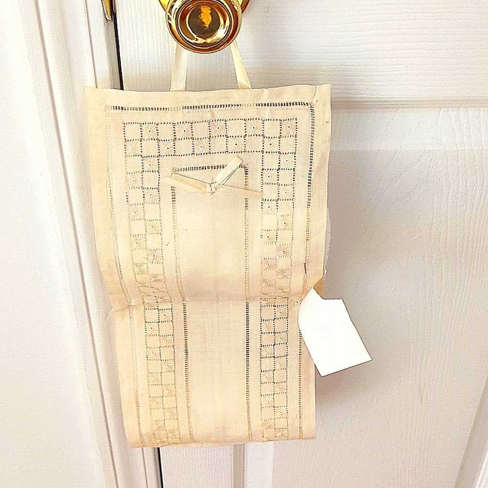 Hand embroidered linen toilet paper hanger